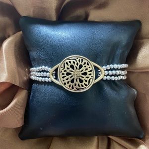 Triple chain silver and gold bracelet